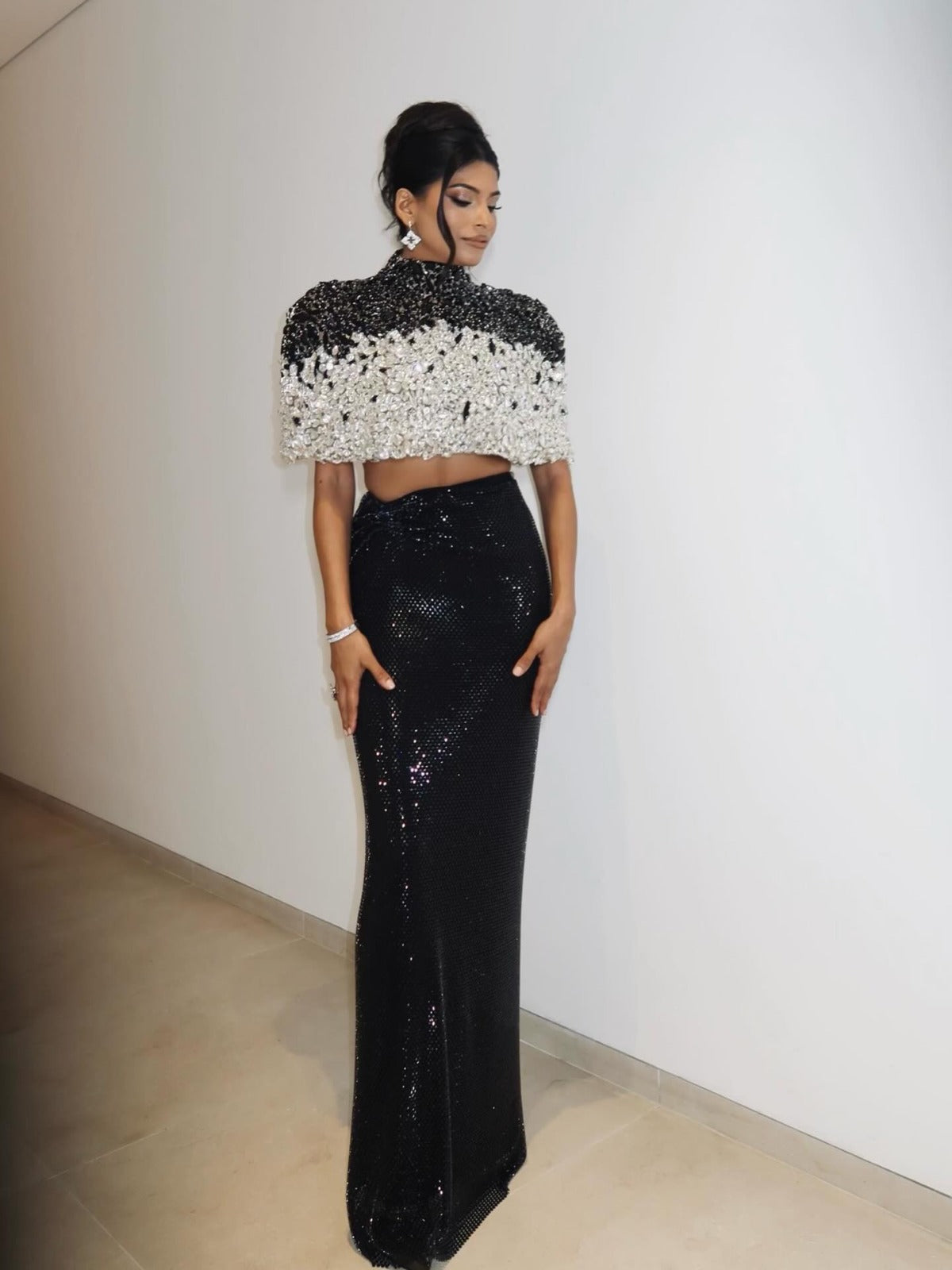Dodona Moments: crystal cape with black sequin maxi skirt